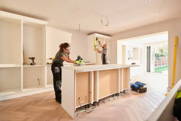 Remodeled kitchen with improved storage, new counters, and efficient cooking layout